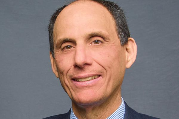 Professional headshot of Zach Aqioutantis.